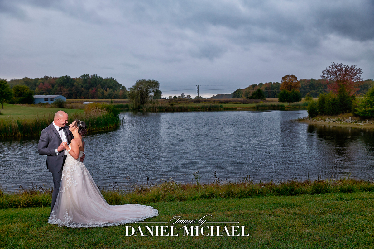 Renee & Chris standing by lake